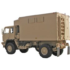 Shop Van Shelter mounted on FMTV in tan